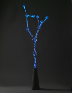 Flameworked borosilicate glass, inert gas, electricity, concrete base
24"w x 24"d x 84"h plasma light art wayne strattman