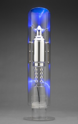 Flameworked and silvered borosilicate glass, inert gas, electricity
6"w x 6"d x 22"h plasma light art wayne strattman
