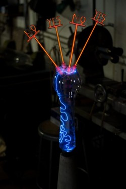 Flameworked borosilicate glass, inert gas, electricity
18"w x 6"d x 36"h Wayne Strattman lighted glass plasma sculpture