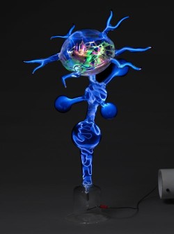 Flameworked borosilicate glass, inert gas, electricity
16"w x 14"d x 24"h plasma light art wayne strattman