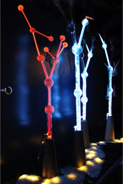 Flameworked borosilicate glass, inert gas, electricity, concrete base
24"w x 24"d x 84"h plasma light art wayne strattman