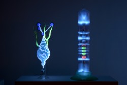 Flameworked borosilicate glass, inert gas, electricity
12"w x 12"d x 24"h
Flameworked and silvered borosilicate glass, inert gas, phosphors, electricity
12"w x 12"d x 26"h plasma light art wayne strattman