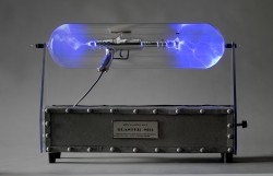 Flameworked and silvered borosilicate glass, inert gas, electricity
18"w x 6"d x 12"h plasma light art wayne strattman