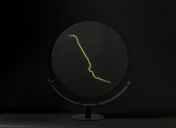 Fused glass, glass beads, inert gas, electricity
24"w x 1"d x 24"h plasma light art wayne strattman